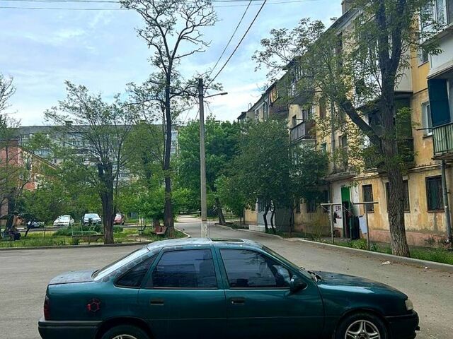 Зеленый Опель Астра, объемом двигателя 2 л и пробегом 300 тыс. км за 1500 $, фото 1 на Automoto.ua