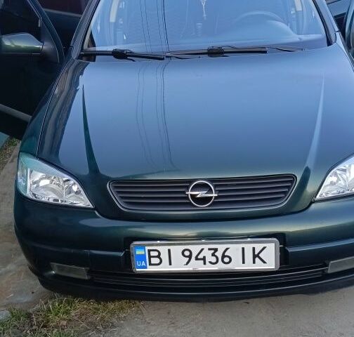 Зеленый Опель Астра, объемом двигателя 1.6 л и пробегом 287 тыс. км за 2800 $, фото 1 на Automoto.ua