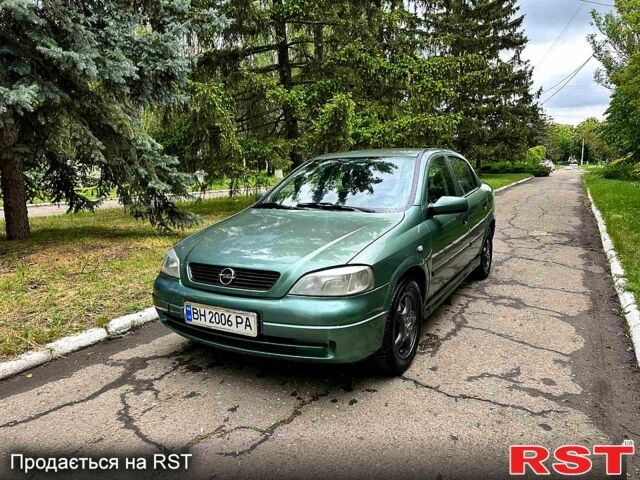 Зеленый Опель Астра, объемом двигателя 1.4 л и пробегом 300 тыс. км за 2350 $, фото 1 на Automoto.ua
