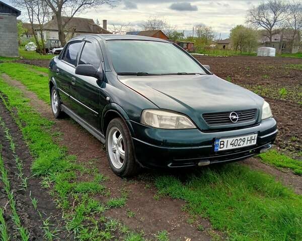 Зеленый Опель Астра, объемом двигателя 1.6 л и пробегом 266 тыс. км за 3700 $, фото 1 на Automoto.ua