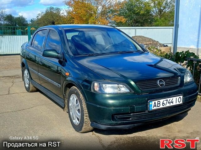 Зеленый Опель Астра, объемом двигателя 1.6 л и пробегом 244 тыс. км за 3300 $, фото 1 на Automoto.ua