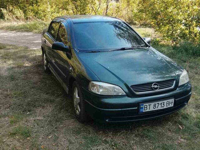 Зеленый Опель Астра, объемом двигателя 1.6 л и пробегом 320 тыс. км за 2043 $, фото 1 на Automoto.ua
