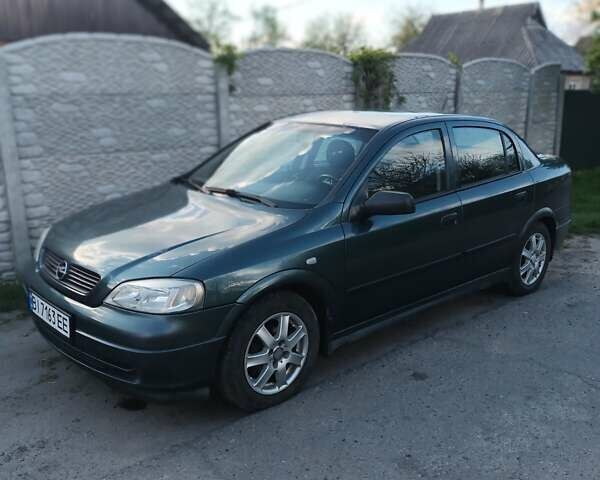 Зеленый Опель Астра, объемом двигателя 1.6 л и пробегом 298 тыс. км за 4000 $, фото 1 на Automoto.ua