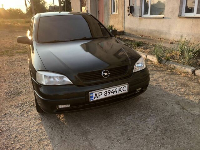 Зеленый Опель Астра, объемом двигателя 1 л и пробегом 330 тыс. км за 2300 $, фото 1 на Automoto.ua