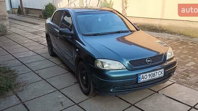 Зеленый Опель Астра, объемом двигателя 1.4 л и пробегом 320 тыс. км за 3400 $, фото 1 на Automoto.ua