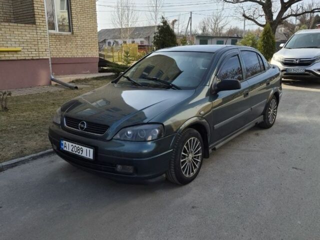 Зеленый Опель Астра, объемом двигателя 1.4 л и пробегом 350 тыс. км за 2500 $, фото 1 на Automoto.ua