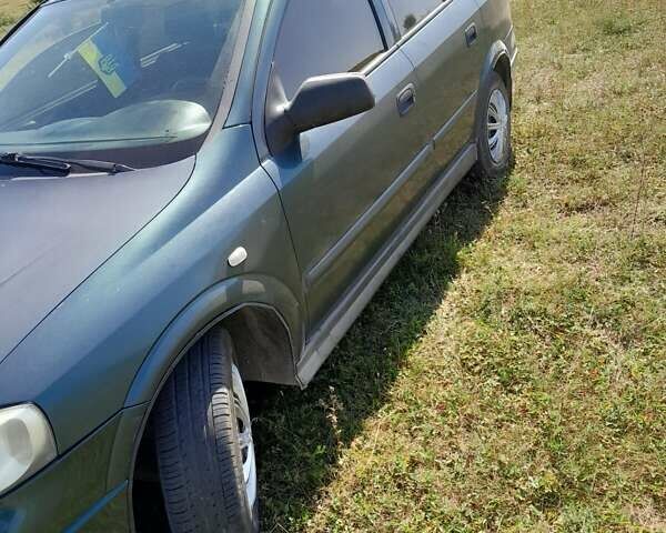 Зеленый Опель Астра, объемом двигателя 1.4 л и пробегом 290 тыс. км за 3150 $, фото 1 на Automoto.ua