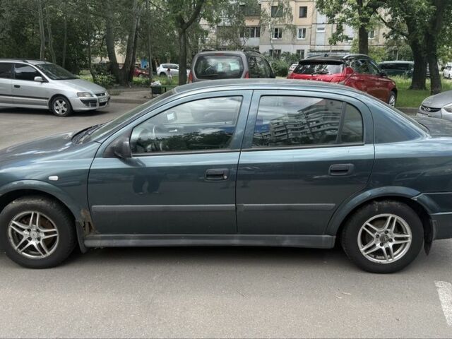 Зеленый Опель Астра, объемом двигателя 1.6 л и пробегом 245 тыс. км за 2236 $, фото 1 на Automoto.ua