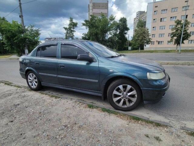 Зелений Опель Астра, об'ємом двигуна 1.4 л та пробігом 213 тис. км за 2457 $, фото 1 на Automoto.ua
