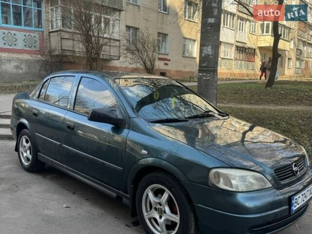 Зеленый Опель Астра, объемом двигателя 1.4 л и пробегом 212 тыс. км за 2800 $, фото 1 на Automoto.ua