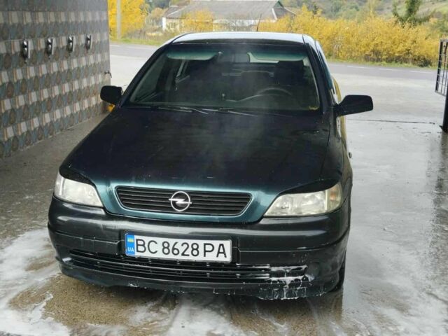Зеленый Опель Астра, объемом двигателя 1.4 л и пробегом 297 тыс. км за 2100 $, фото 1 на Automoto.ua