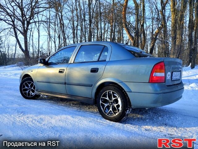 Зеленый Опель Астра, объемом двигателя 1.4 л и пробегом 208 тыс. км за 3600 $, фото 1 на Automoto.ua