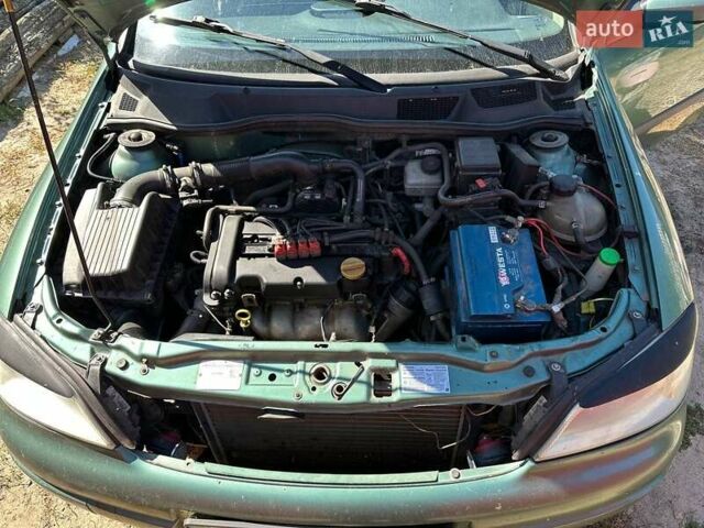 Зеленый Опель Астра, объемом двигателя 1.4 л и пробегом 300 тыс. км за 2300 $, фото 1 на Automoto.ua
