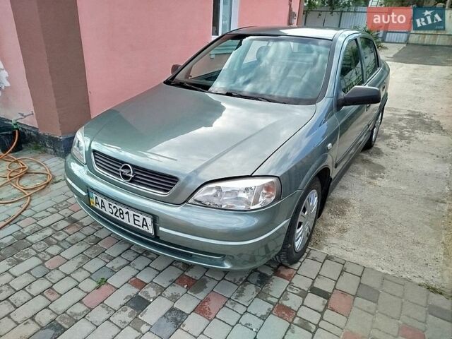 Зеленый Опель Астра, объемом двигателя 1.4 л и пробегом 170 тыс. км за 3250 $, фото 1 на Automoto.ua