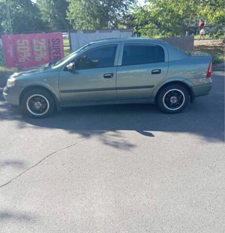 Зеленый Опель Астра, объемом двигателя 1.4 л и пробегом 290 тыс. км за 2500 $, фото 1 на Automoto.ua