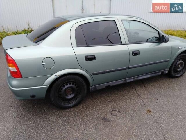 Зеленый Опель Астра, объемом двигателя 1.4 л и пробегом 296 тыс. км за 4200 $, фото 1 на Automoto.ua