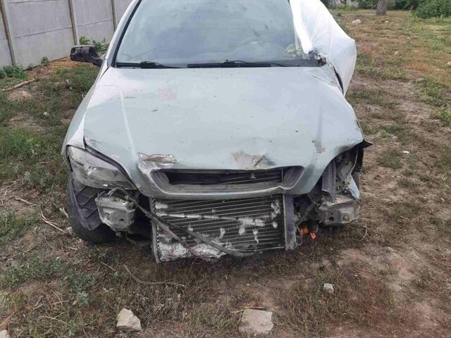 Зеленый Опель Астра, объемом двигателя 1.6 л и пробегом 190 тыс. км за 600 $, фото 1 на Automoto.ua