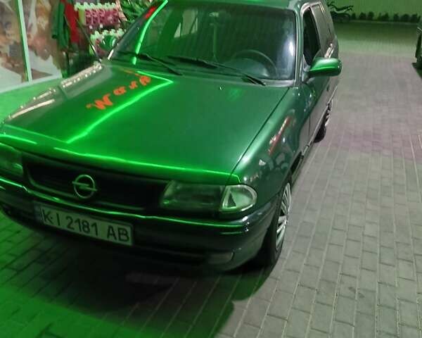 Зелений Опель Астра, об'ємом двигуна 1.6 л та пробігом 259 тис. км за 1899 $, фото 1 на Automoto.ua