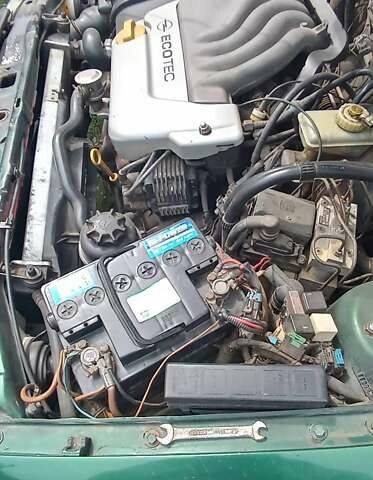 Зеленый Опель Астра, объемом двигателя 1.6 л и пробегом 398 тыс. км за 2050 $, фото 1 на Automoto.ua