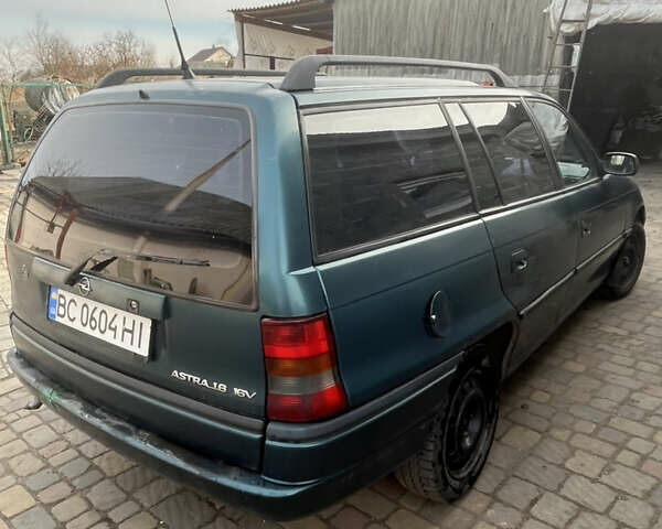 Зеленый Опель Астра, объемом двигателя 1.6 л и пробегом 255 тыс. км за 2100 $, фото 1 на Automoto.ua
