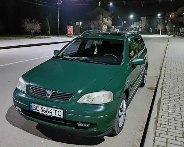 Зеленый Опель Астра, объемом двигателя 1.7 л и пробегом 380 тыс. км за 2400 $, фото 1 на Automoto.ua