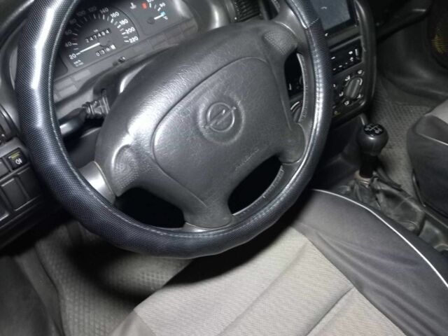 Зеленый Опель Астра, объемом двигателя 1.4 л и пробегом 279 тыс. км за 1250 $, фото 1 на Automoto.ua