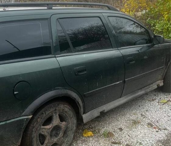 Зеленый Опель Астра, объемом двигателя 1.8 л и пробегом 245 тыс. км за 1900 $, фото 1 на Automoto.ua