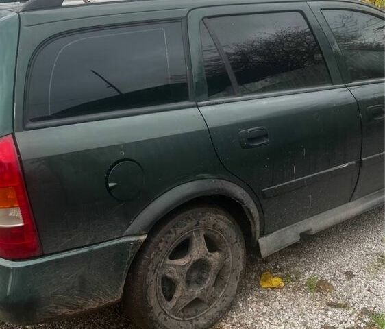 Зеленый Опель Астра, объемом двигателя 1.8 л и пробегом 245 тыс. км за 1200 $, фото 1 на Automoto.ua