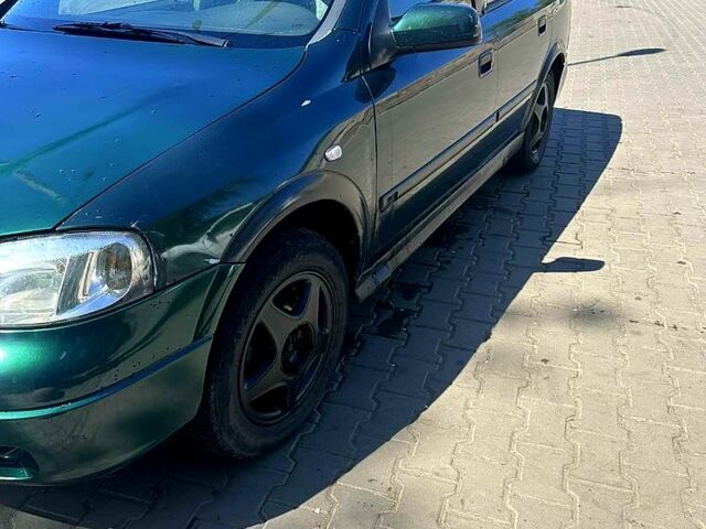 Зеленый Опель Астра, объемом двигателя 1.8 л и пробегом 264 тыс. км за 3000 $, фото 1 на Automoto.ua