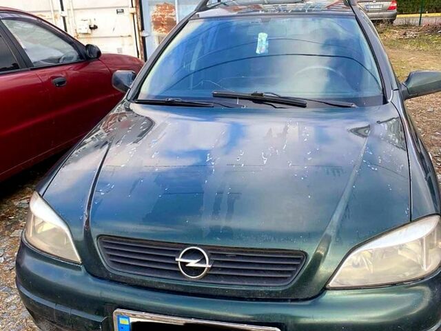Зеленый Опель Астра, объемом двигателя 1.4 л и пробегом 389 тыс. км за 2450 $, фото 1 на Automoto.ua