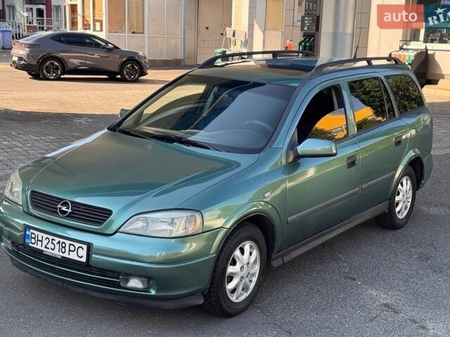 Зелений Опель Астра, об'ємом двигуна 1.39 л та пробігом 300 тис. км за 2700 $, фото 1 на Automoto.ua