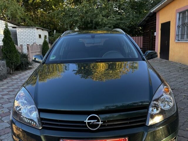 Зелений Опель Астра, об'ємом двигуна 1.6 л та пробігом 202 тис. км за 5300 $, фото 1 на Automoto.ua