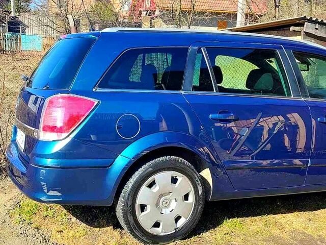 Зеленый Опель Астра, объемом двигателя 1.8 л и пробегом 111 тыс. км за 1600 $, фото 1 на Automoto.ua