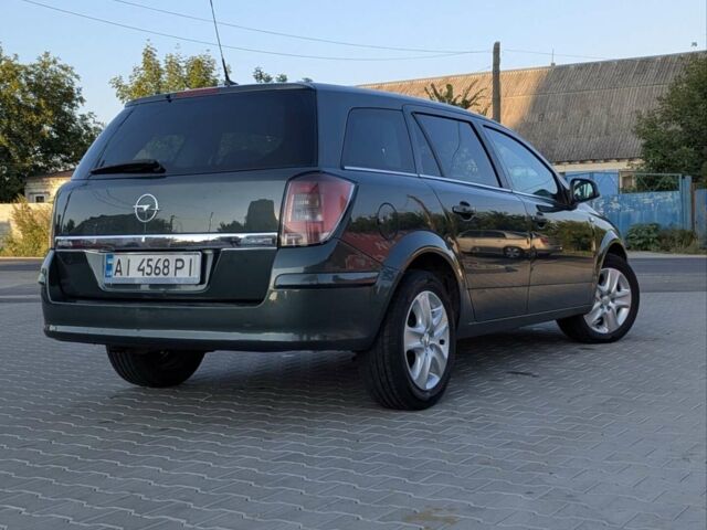 Зелений Опель Астра, об'ємом двигуна 1.69 л та пробігом 296 тис. км за 6500 $, фото 1 на Automoto.ua