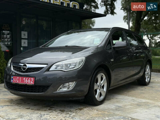 Оранжевый Опель Астра, объемом двигателя 1.7 л и пробегом 171 тыс. км за 7800 $, фото 1 на Automoto.ua