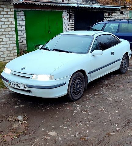 Белый Опель Калибра, объемом двигателя 2 л и пробегом 300 тыс. км за 1400 $, фото 1 на Automoto.ua