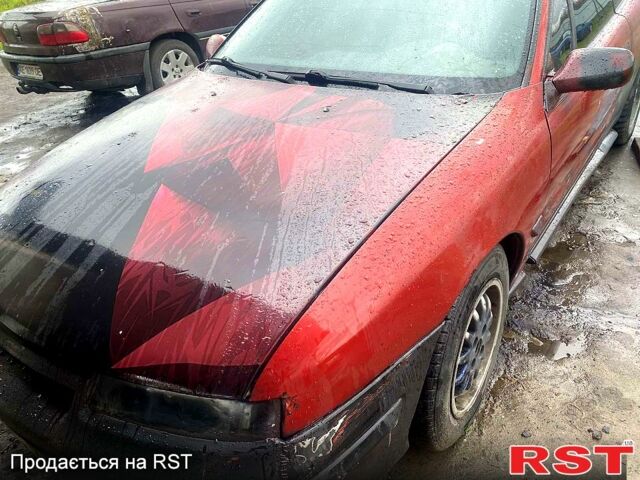 Красный Опель Калибра, объемом двигателя 2 л и пробегом 119 тыс. км за 1500 $, фото 1 на Automoto.ua
