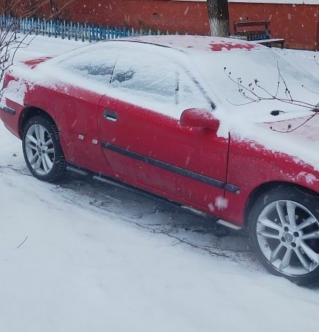 Красный Опель Калибра, объемом двигателя 0 л и пробегом 250 тыс. км за 1848 $, фото 1 на Automoto.ua