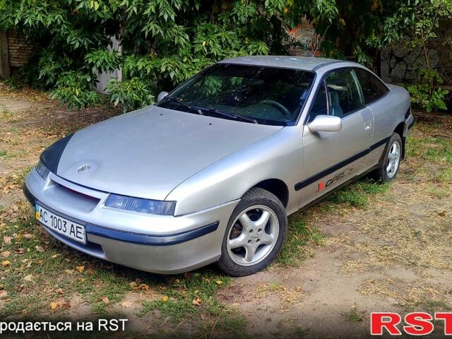 Сірий Опель Калібра, об'ємом двигуна 2 л та пробігом 333 тис. км за 1500 $, фото 1 на Automoto.ua