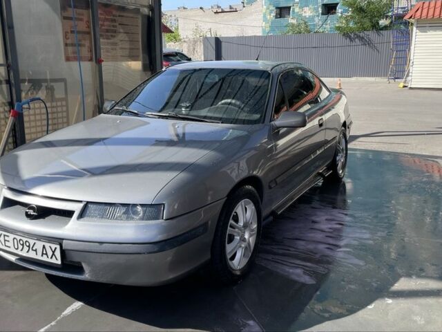 Сірий Опель Калібра, об'ємом двигуна 2 л та пробігом 233 тис. км за 4000 $, фото 1 на Automoto.ua