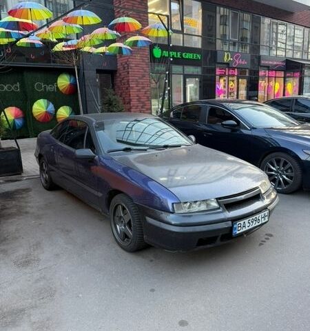 Синій Опель Калібра, об'ємом двигуна 2 л та пробігом 450 тис. км за 2500 $, фото 1 на Automoto.ua