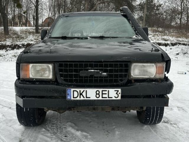 Черный Опель Кампо, объемом двигателя 3 л и пробегом 321 тыс. км за 1768 $, фото 1 на Automoto.ua