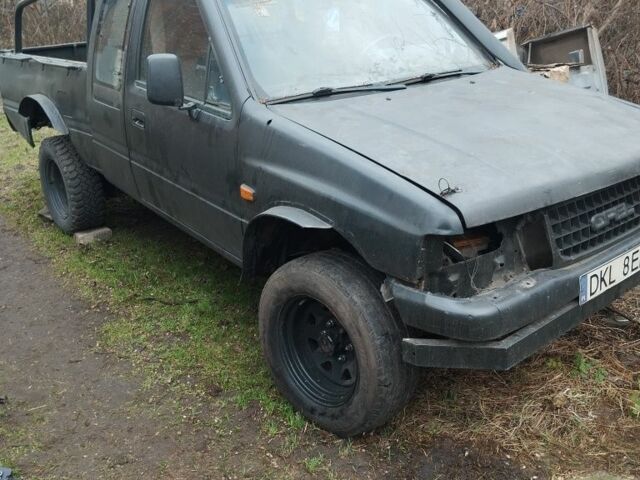 Черный Опель Кампо, объемом двигателя 2.7 л и пробегом 340 тыс. км за 949 $, фото 1 на Automoto.ua