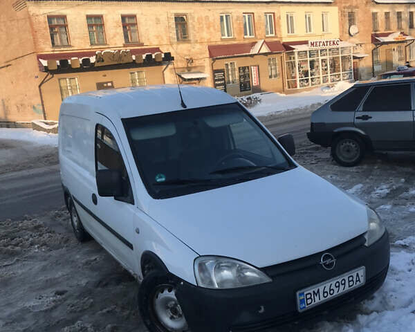 Белый Опель Комбо груз.-пасс., объемом двигателя 1.25 л и пробегом 410 тыс. км за 3100 $, фото 1 на Automoto.ua