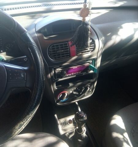 Белый Опель Комбо груз.-пасс., объемом двигателя 1.25 л и пробегом 314 тыс. км за 3100 $, фото 1 на Automoto.ua