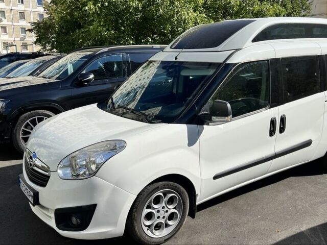 Білий Опель Комбо вант.-пас., об'ємом двигуна 2 л та пробігом 164 тис. км за 15500 $, фото 1 на Automoto.ua