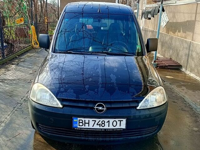 Черный Опель Комбо груз.-пасс., объемом двигателя 1.2 л и пробегом 430 тыс. км за 3500 $, фото 1 на Automoto.ua