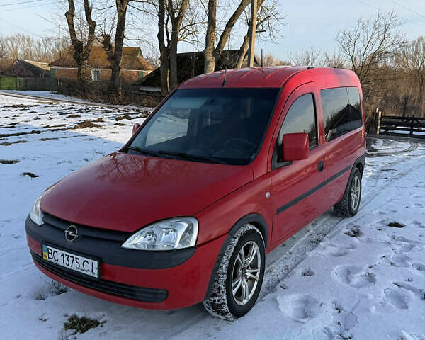 Красный Опель Комбо груз.-пасс., объемом двигателя 1.7 л и пробегом 390 тыс. км за 4200 $, фото 1 на Automoto.ua