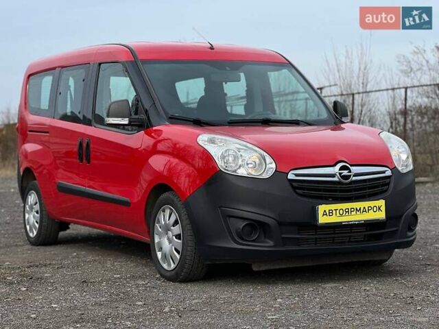 Красный Опель Комбо груз.-пасс., объемом двигателя 1.6 л и пробегом 215 тыс. км за 12890 $, фото 1 на Automoto.ua