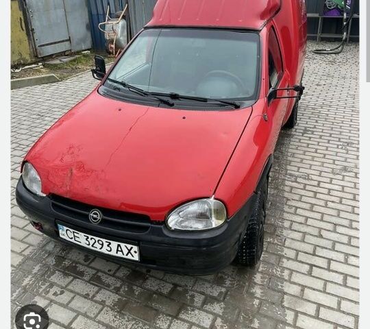 Красный Опель Комбо груз.-пасс., объемом двигателя 1.7 л и пробегом 100 тыс. км за 300 $, фото 1 на Automoto.ua